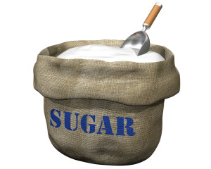 Bag of sugar with a big scoop.