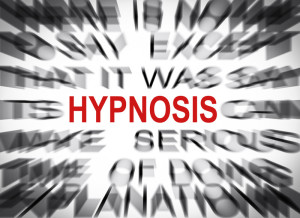 The word hypnosis surrounded by blurry words