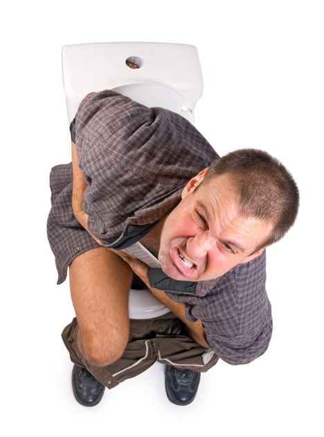 man-on-toilet-grimacing-in-pain-IBS-Pain-and-Cramping.jpg